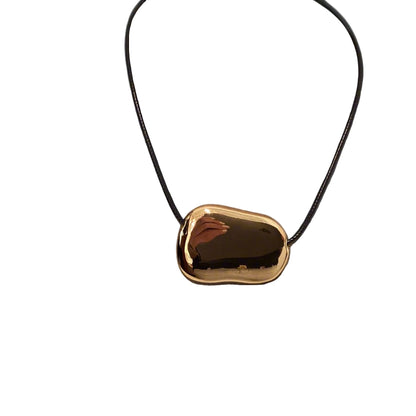Gold Pebble Pendant on Adjustable Black Leather Cord