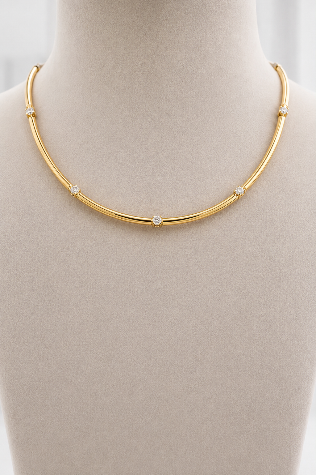 Diamond and gold tube collar necklace with spaced diamond stations