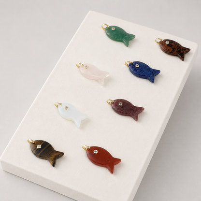 Natural stone fish charm on a gold necklace, alternate view 2