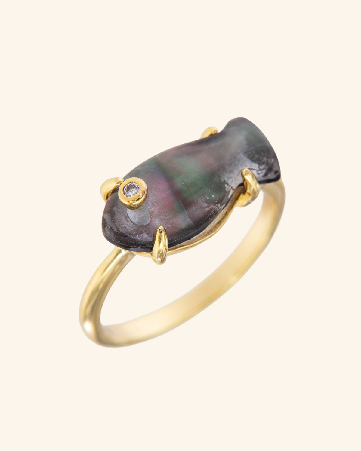 Black mother of pearl fish ring in champagne gold plated sterling silver