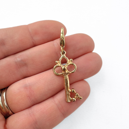 Small vintage gold tone skeleton key charm pendant, alternate view 2