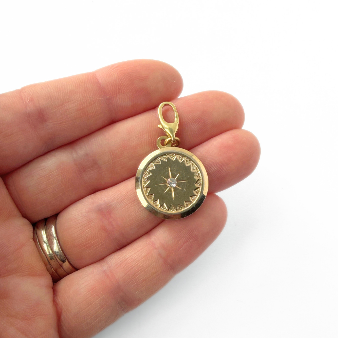 Vintage gold plated circular charm with rhinestone center, alternate view 2